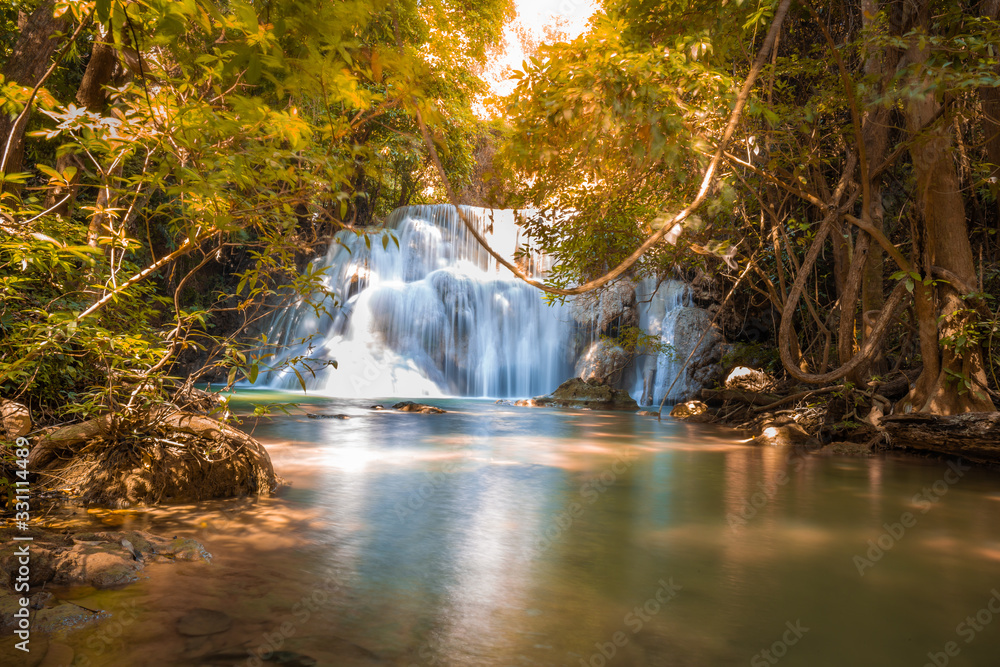 Landscape of Huai Mae Kamin waterfall Srinakarin Is a waterfall in the deep forest in autumn atmosphere at Kanchanaburi, Thailand. Landscape of Huai Mae Kamin waterfall Srinakarin Is a waterfall in the deep forest in autumn atmosphere at Kanchanaburi, Thailand.