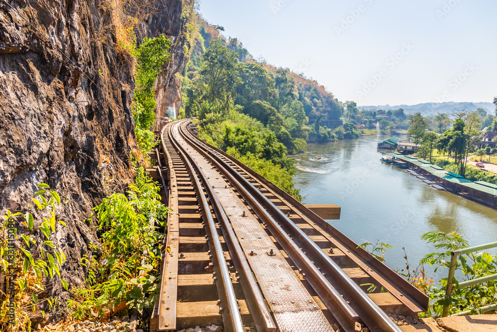 Fototapeta premium The Death Railway crossing kwai river in Kanchanaburi Thailand. Important landmark and destination to visiting and world war II history builted