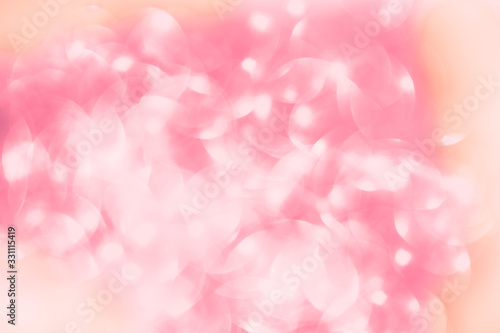 Shimmering blur spot light on pink cherry color background, Christmas concept