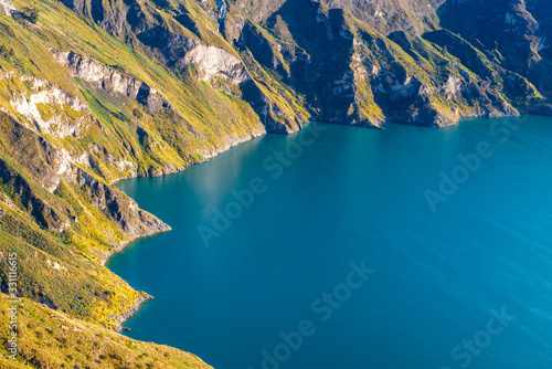 The turquoise crater lagoon of Quilotoa, a dormant volcano, seen along the Quilotoa Loop hike. Located near Latacunga city, south of Quito, Ecuador. 
