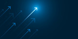 Up light arrow on dark blue background with copy space, business growth concept.