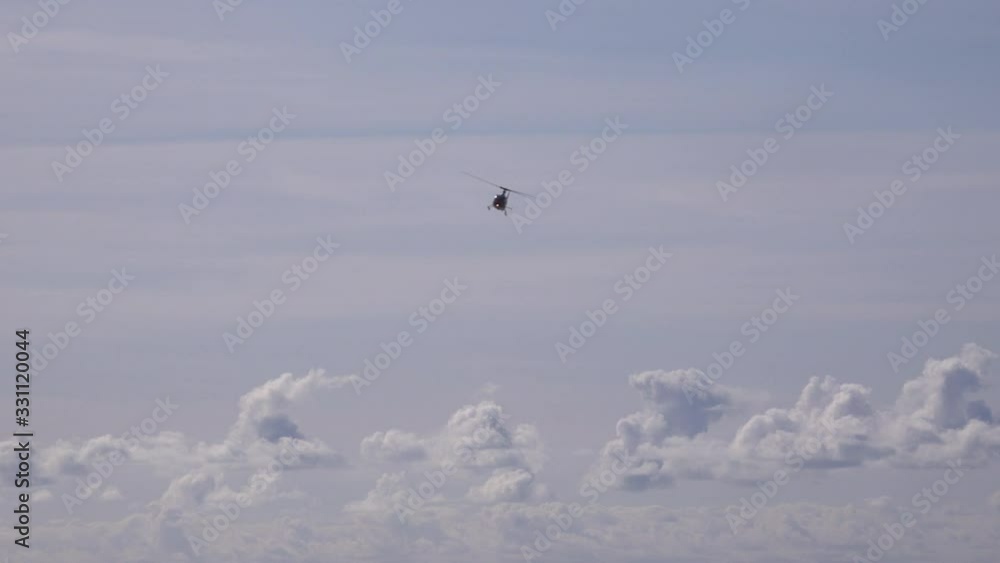 Military helicopter in the sky doing aerobatics UK 4K Military helicopter in the sky doing aerobatics UK 4K