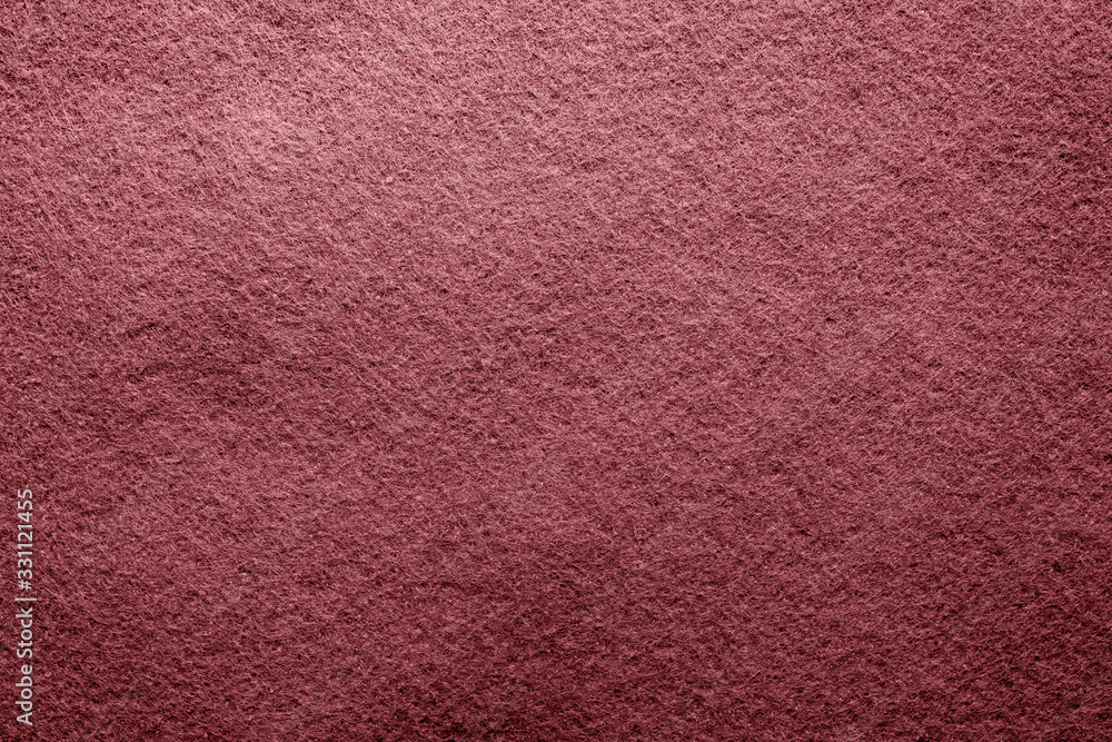 Fototapeta premium Abstract background with brown texture, velvet fabric, close-up. Colorful felt texture for background with copy space. Felt fabric sheet