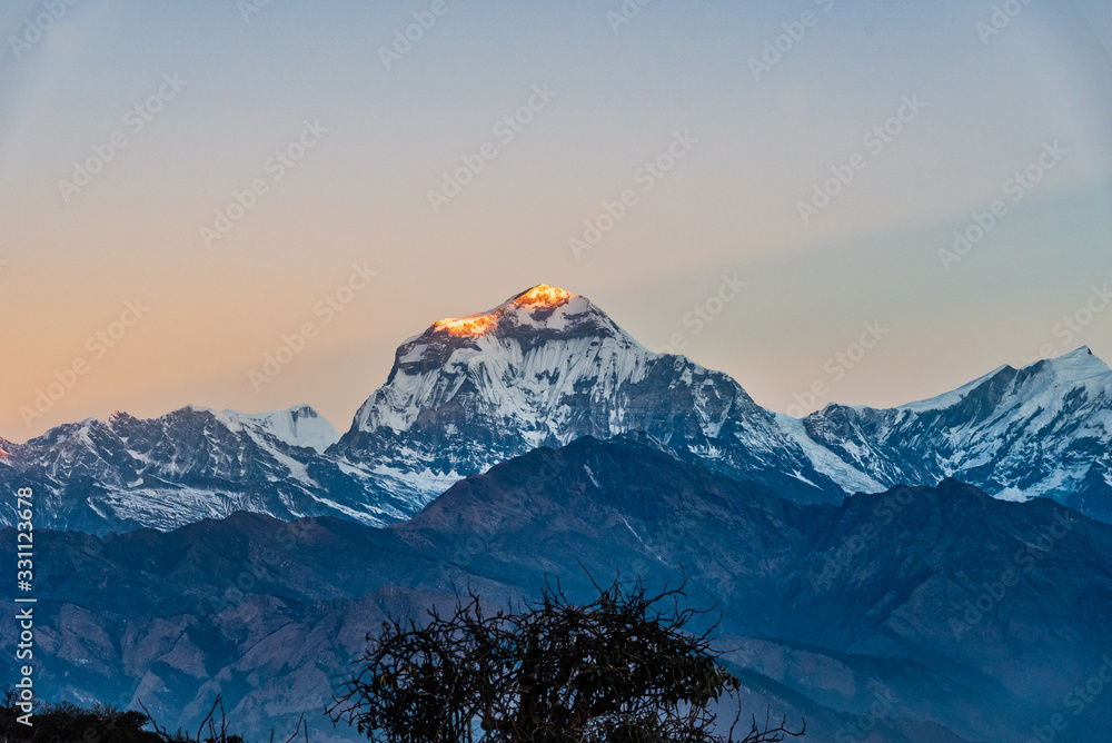 Majestic view of sunset sweeping through Dhaulagiri mountain range from Poon Hill, Ghorepani, Nepal