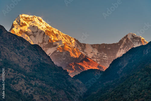 Fototapeta Naklejka Na Ścianę i Meble -  Beautiful view of sunrise of Annapurna South in Kaski region Pokhara Nepal