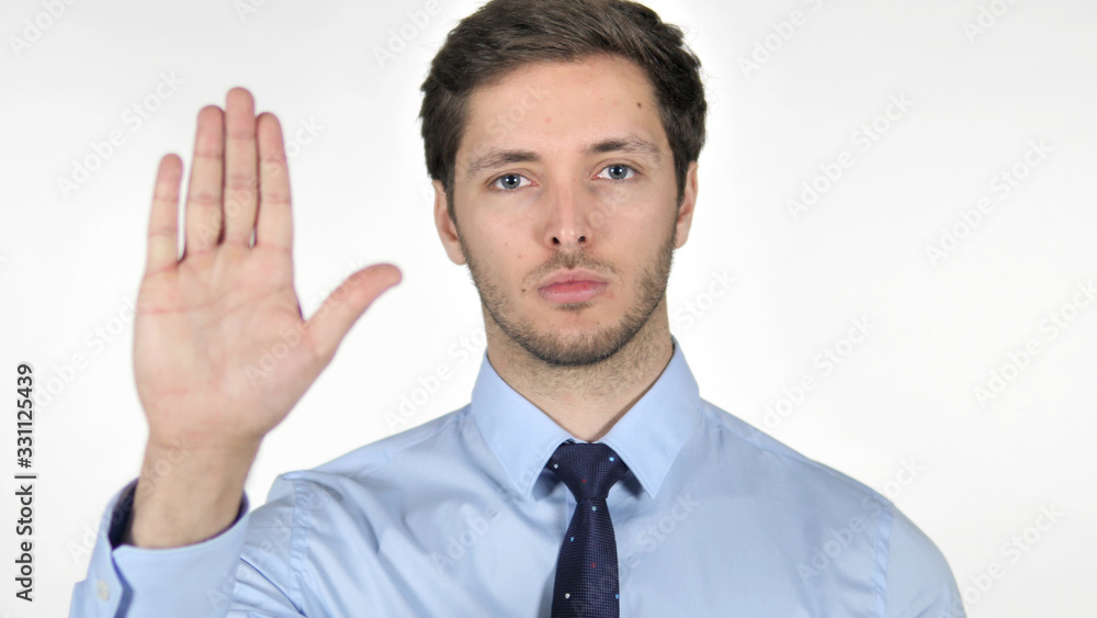 Stop Gesture by Young Businessman on White Background Stop Gesture by Young Businessman on White Background