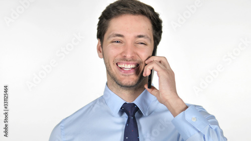 Young Businessman Talking on Phone on White Background