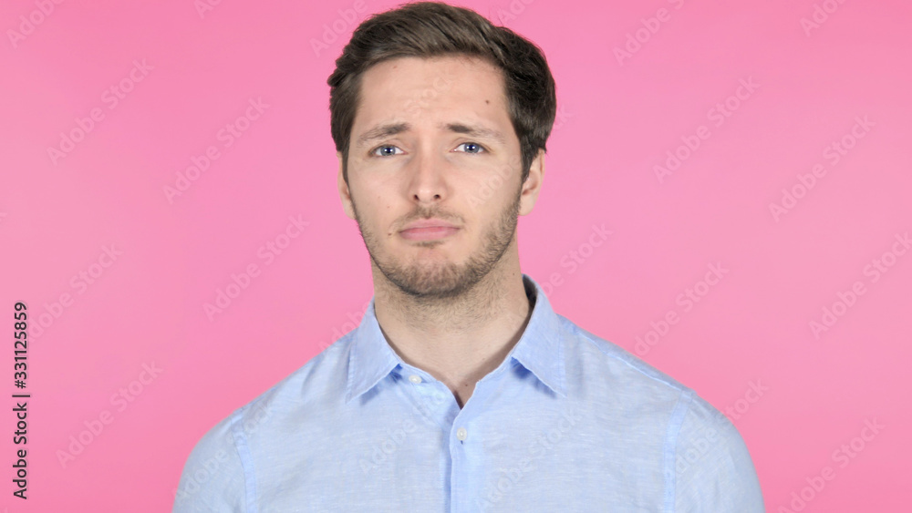 © stockbakers - No, Disliking Young Man on Pink Background © stockbakers - No, Disliking Young Man on Pink Background