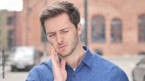 Toothache, Young Man with Tooth Infection