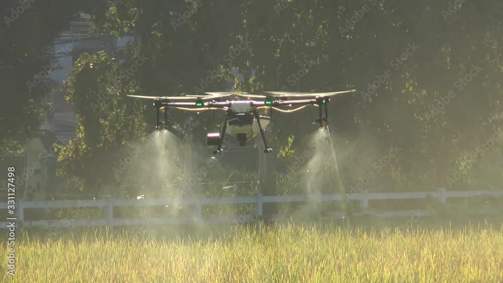 Modern agricultural drones that are spraying chemicals to eliminate plants. Modern agricultural drones that are spraying chemicals to eliminate plants.