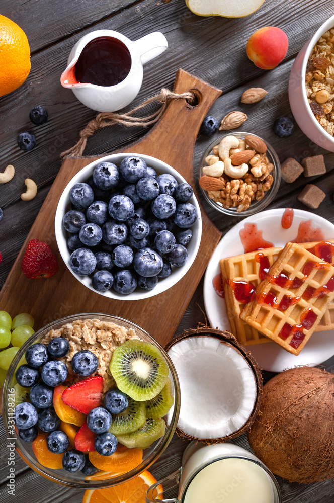 Concept of healthy diet. Breakfast with fruits, berries, granola. Concept of healthy diet. Breakfast with fruits, berries, granola.