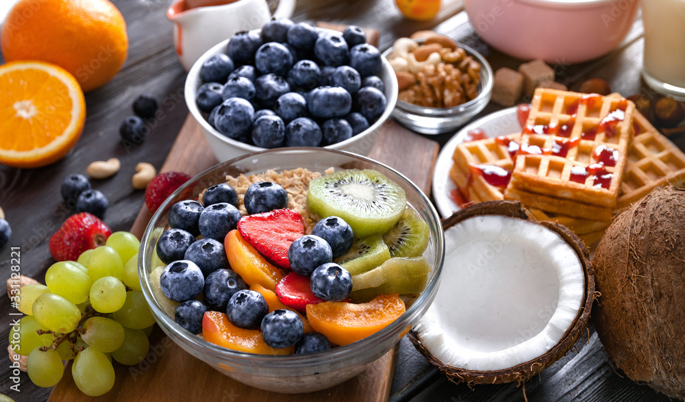 Concept of healthy diet. Breakfast with fruits, berries, granola. Concept of healthy diet. Breakfast with fruits, berries, granola.