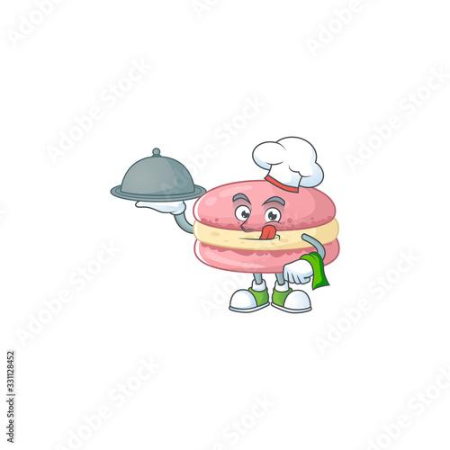 chef cartoon character of strawberry macarons with food on tray