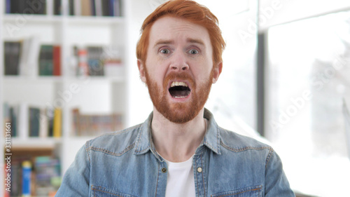 Failure, Young Casual Redhead Man Upset by Loss