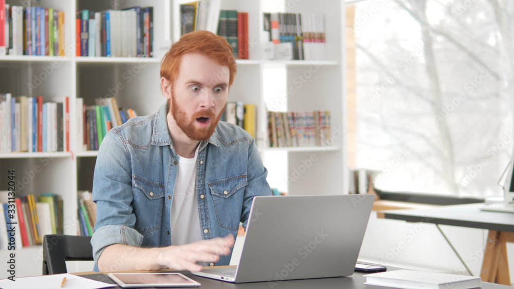 Shocked Young Casual Redhead Man Astonished by Loss