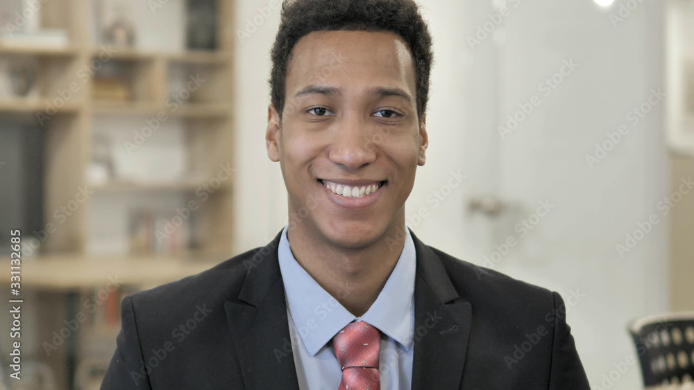 Smiling Young African Businessman Smiling Young African Businessman