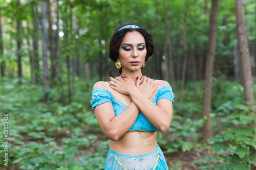 Obraz na plátně Portrait of princess Jasmine, a young woman in the image of an Eastern fairy Princess outdoor