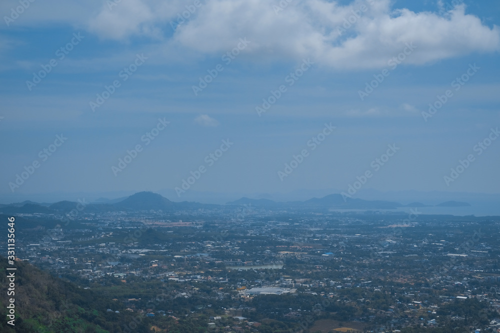 High view of the city and the ocean. Bird's-eye view of Paradise island. High view of the city and the ocean. Bird's-eye view of Paradise island.