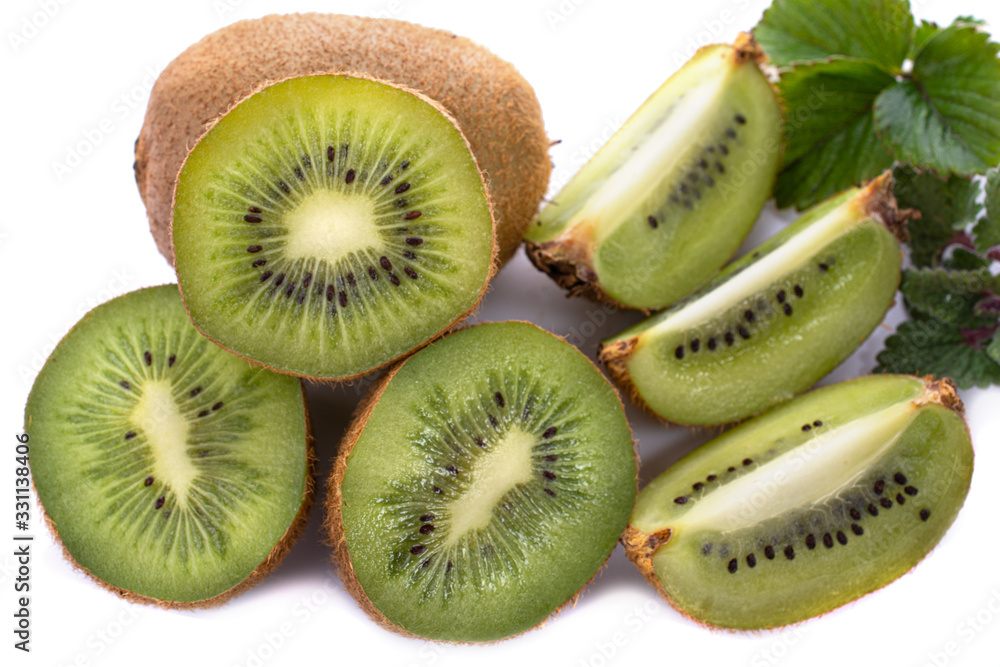 Fototapeta premium Kiwi fruit with pieces isolated on a white background, close -up.