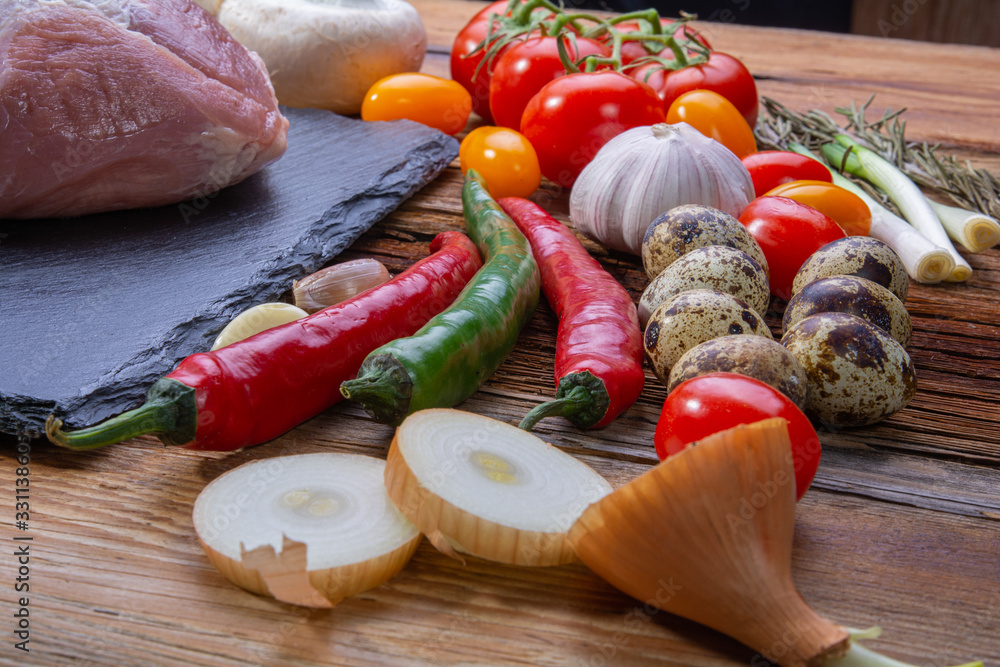 ingredients for cooking on a wooden rustic table ingredients for cooking on a wooden rustic table