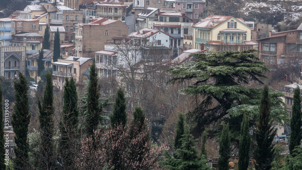 Tbilisi. Georgia country. March 2020. The old city. Salalaki District.  Suddenly in mid-March it started to snow Photos | Adobe Stock