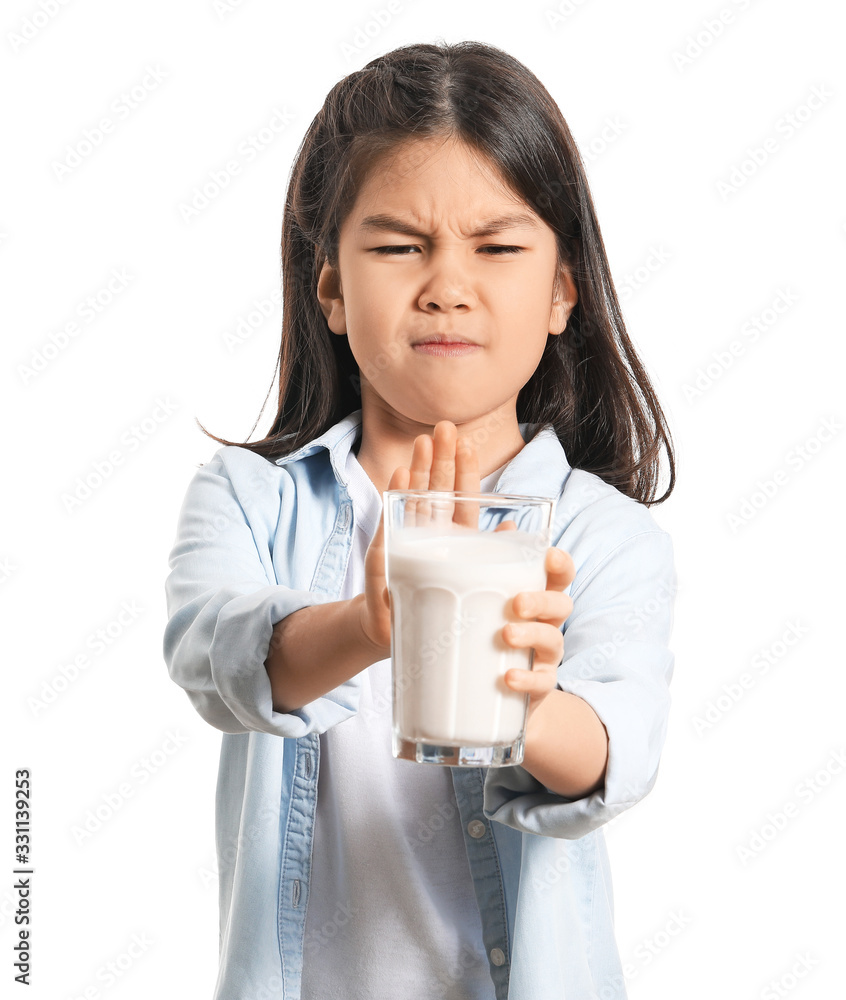 Cute Asian girl with dairy allergy on white background Cute Asian girl with dairy allergy on white background