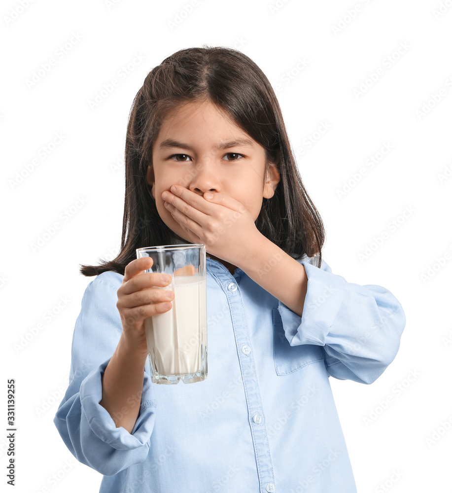 Cute Asian girl with dairy allergy on white background Cute Asian girl with dairy allergy on white background