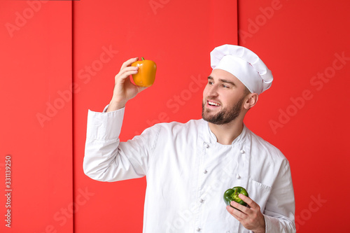 Handsome male chef with bel...