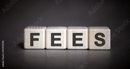 FEES - financial business concept on a dark background