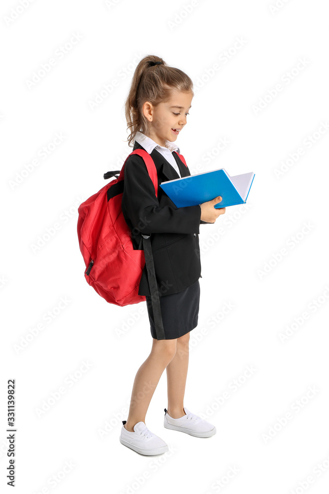 Cute little schoolgirl with book on white background Cute little schoolgirl with book on white background