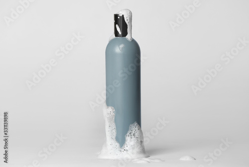 Photos Bottle of shampoo on light background