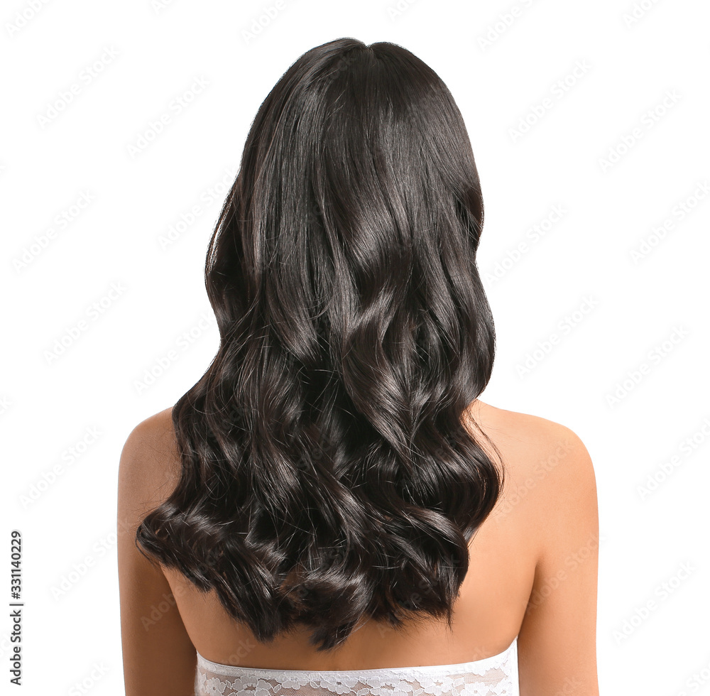 Naklejka premium Young Asian woman with beautiful long hair on white background