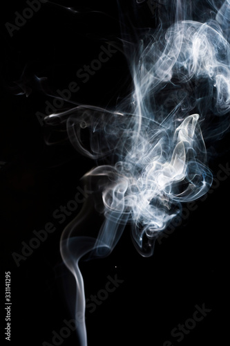 Abstract smoke on black background for designs. 