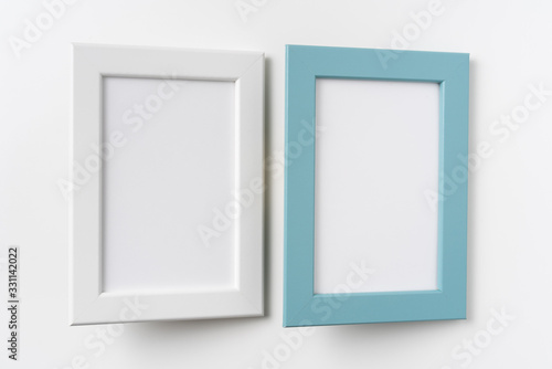 top view of two black and green wood photo frame