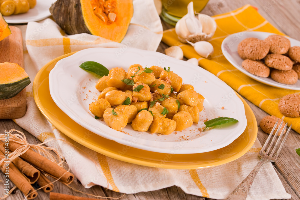 Pumpkin gnocchi with grated amaretti cookies. Pumpkin gnocchi with grated amaretti cookies.