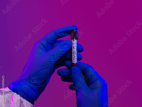 Coronavirus, Doctor holding positive covid-19 virus Blood Sample tube