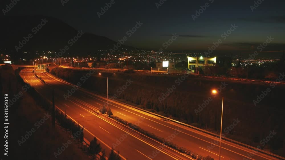 Long exposure time lapse of car lights on highway from blue to dark sky Long exposure time lapse of car lights on highway from blue to dark sky
