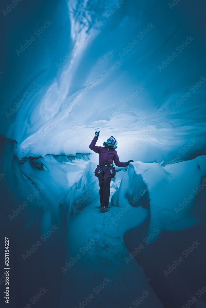 girl in a beautiful ice cave
