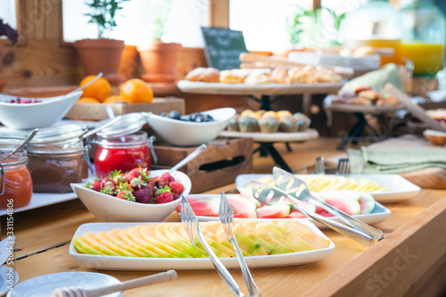 Obraz na płótnie Breakfast buffet table filed with assorted foods
