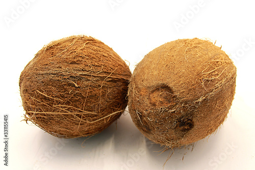 Whole Coconuts Closeup Isolated on White Background photo