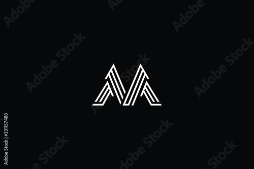 Minimal elegant monogram art logo. Outstanding professional trendy awesome artistic M MM MV VM initial based Alphabet icon logo. Premium Business logo White color on black background
