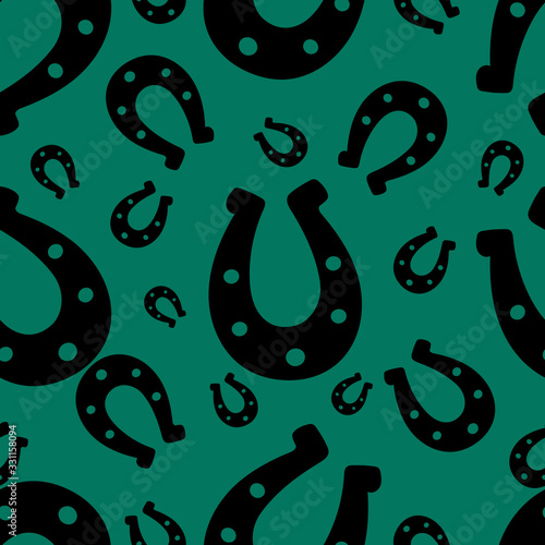  Silhouette of a happy horseshoe. Seamless vector pattern. Endless ornament. Isolated emerald background. Horse shoes. Imitation of ink drawing. Flat style. Idea for web design, covers, textiles.