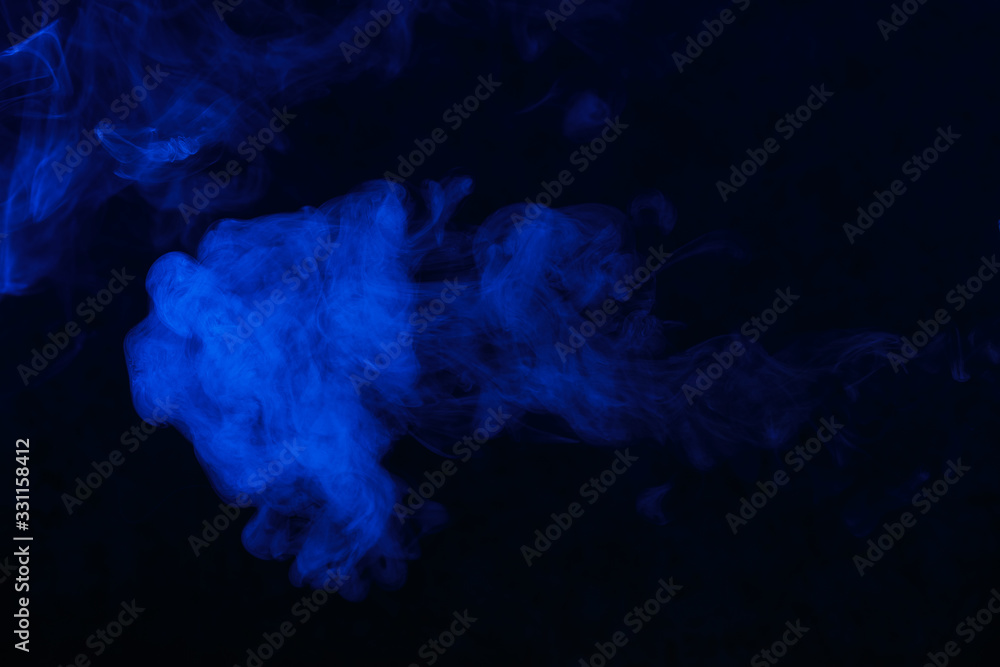 blue smoke on a black background, suitable for advertising a hookah, vape, car smoke, photo shoot or creating a different atmosphere blue smoke on a black background, suitable for advertising a hookah, vape, car smoke, photo shoot or creating a different atmosphere