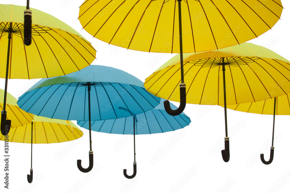 Colorful umbrellas background. Colorful umbrellas in the sky. Street decoration. Isolated on white	
