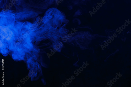 blue smoke on a black background, suitable for advertising a hookah, vape, car smoke, photo shoot or creating a different atmosphere photo