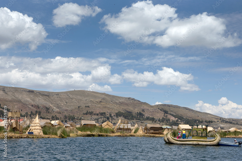 Puno Peru. Lake Titicaca. Floating village. Uros people. Reed culture. Reed houses.