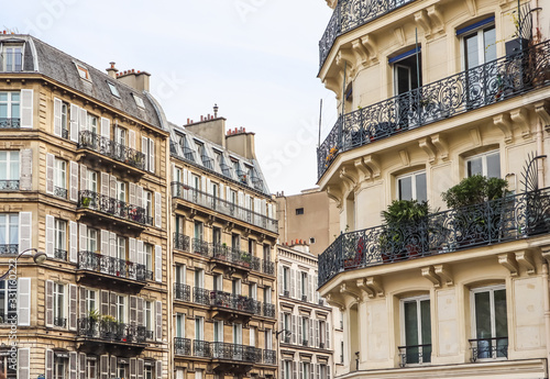 Architecture of Paris France. Facades of a traditional apartment buildings