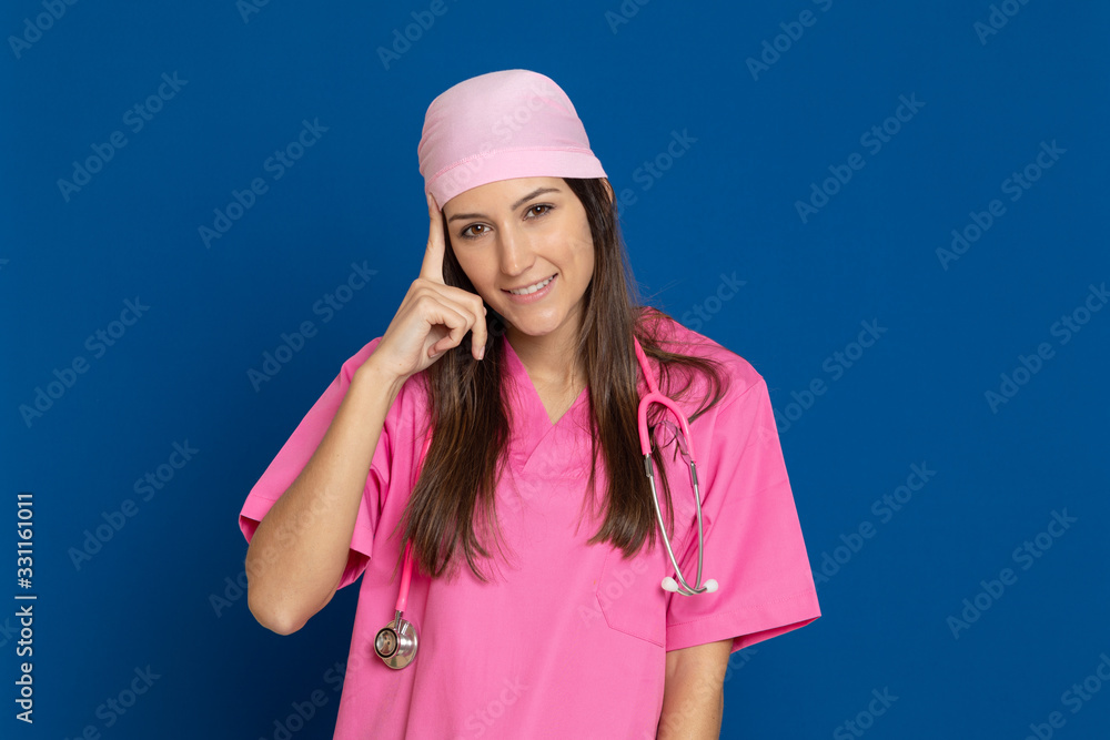 Young doctor with a pink uniform Young doctor with a pink uniform