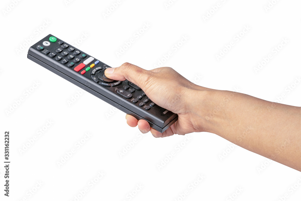 Hand pressing remote control TV television with clipping path isolated on white background. Hand pressing remote control TV television with clipping path isolated on white background.
