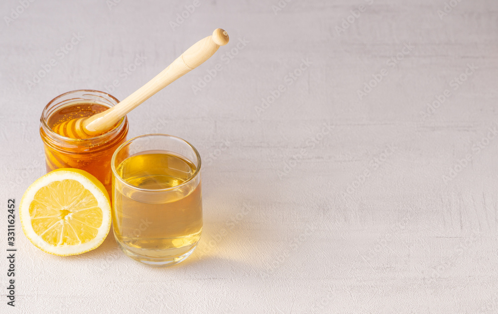 Honey jar, pot, tea, lemon, wooden spoon. Health. immunity. Isolated. Honey jar, pot, tea, lemon, wooden spoon. Health. immunity. Isolated.